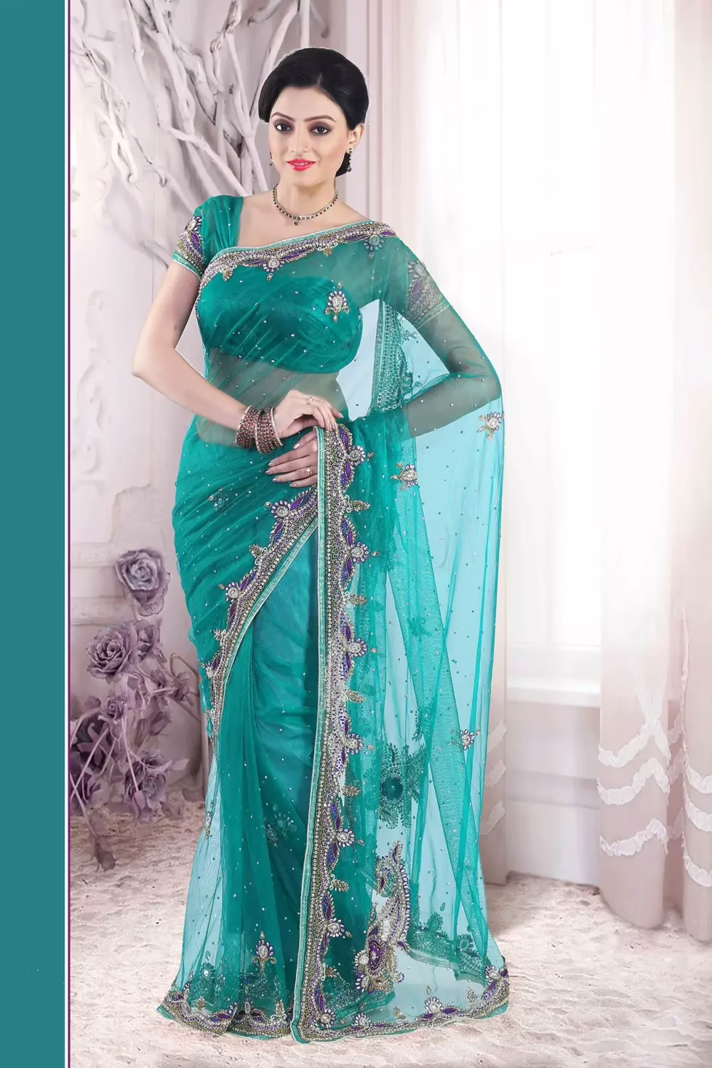 Pazaar Pine Green embroidered party saree with zari thread
